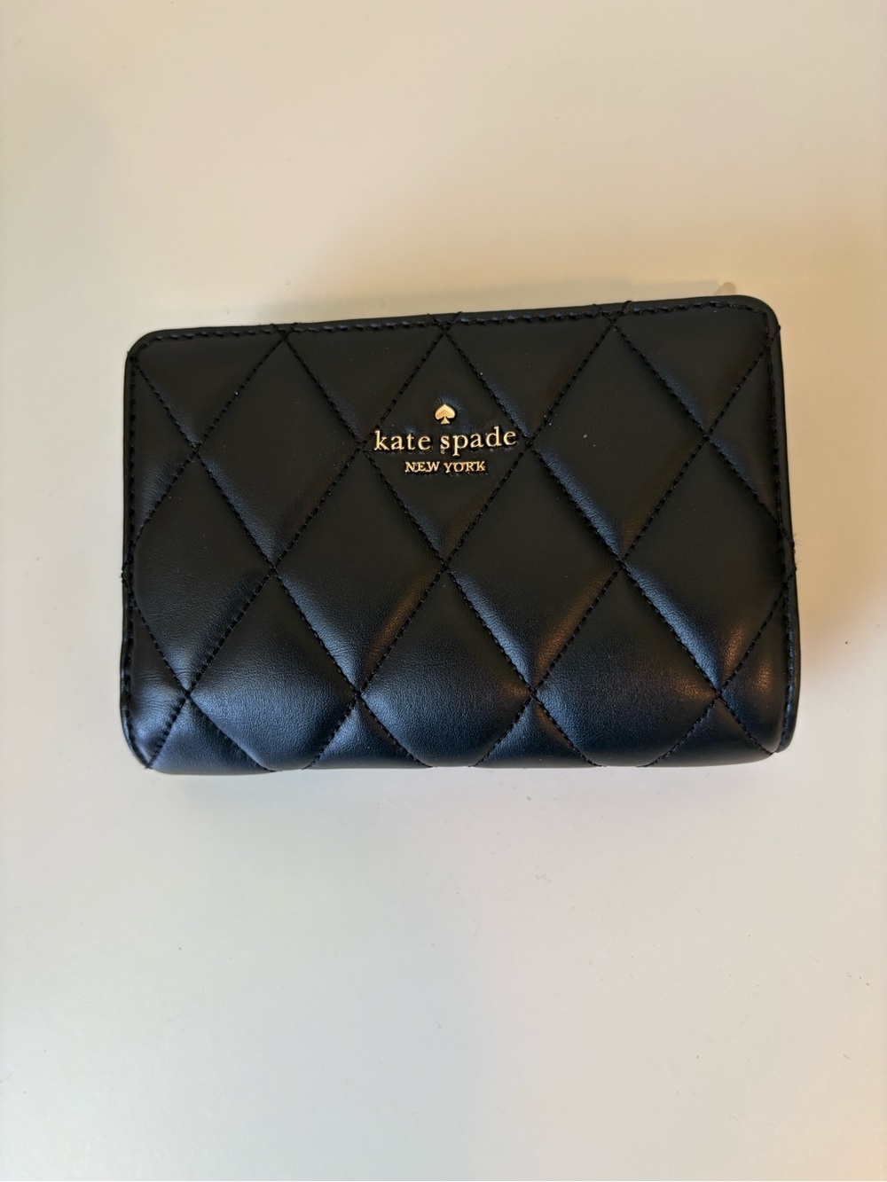kate spade Black Quilted Leather Zip Wallet with Gold Accent